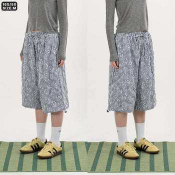 AGILITY MIAO - Plaid Cropped Pants - Dark Blue