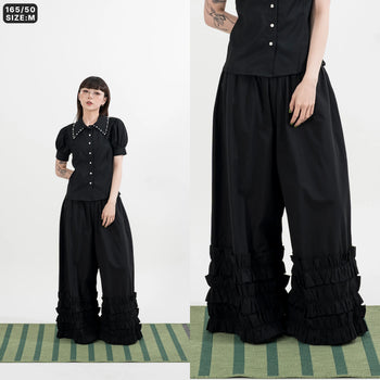 AGILITY MIAO - Wide Ruffle Pants - Black