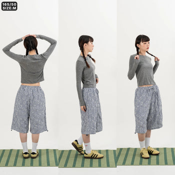 AGILITY MIAO - Plaid Cropped Pants - Dark Blue