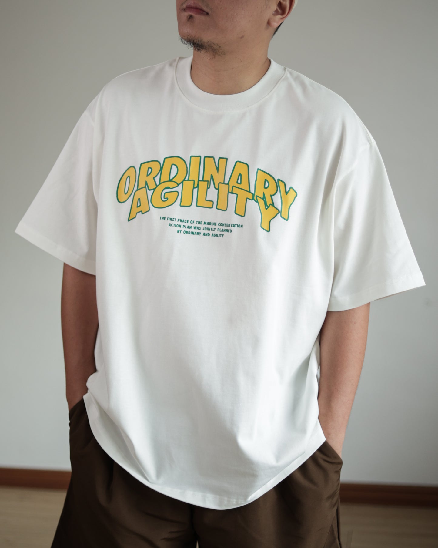 Agility X Ordinary Pisces Slogan Tee